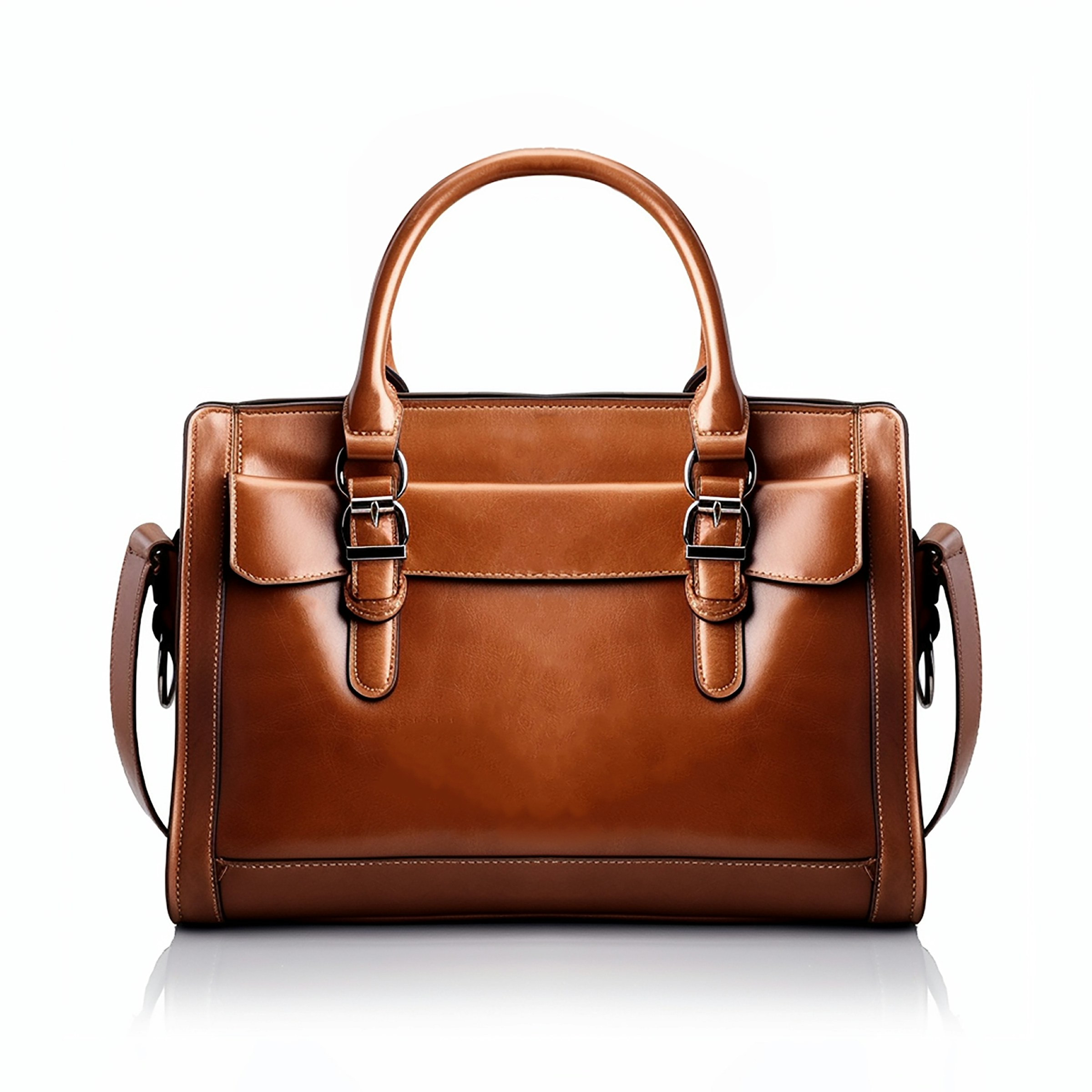 Tan leather bag with buckled front pocket on a warm cream background