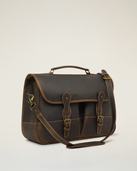 Tusting Leather Clipper (Large) in Aztec Crazyhorse leather, three-quarter view on a plain cream backdrop, with brass buckles and a detachable shoulder strap