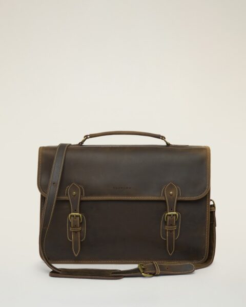 Tusting Wymington briefcase in Aztec Crazyhorse leather, front view showing the flap, two buckled straps and the shoulder strap